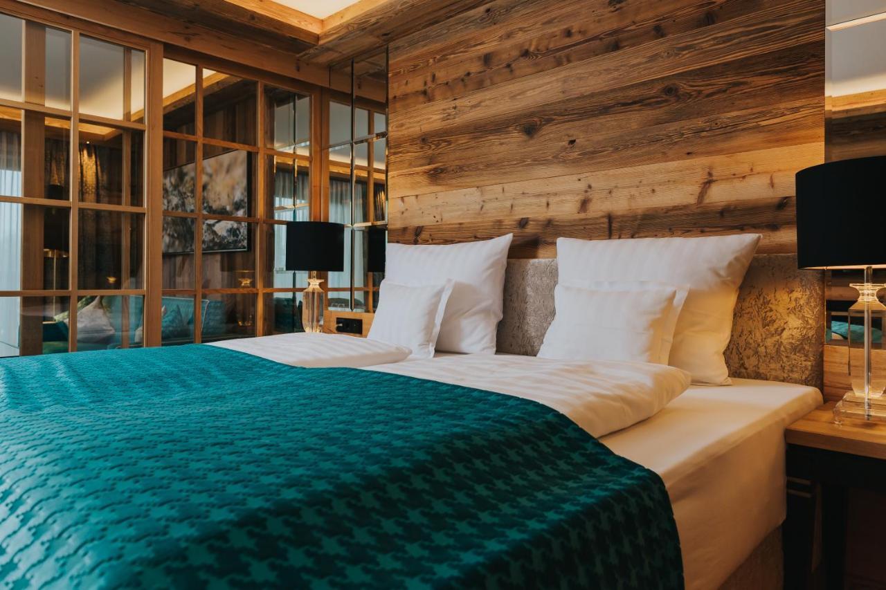 Ortner'S Resort Bad Füssing Екстериор снимка A bedroom at the Hotel de la Poste